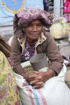 Sumatran coffee seller at market small