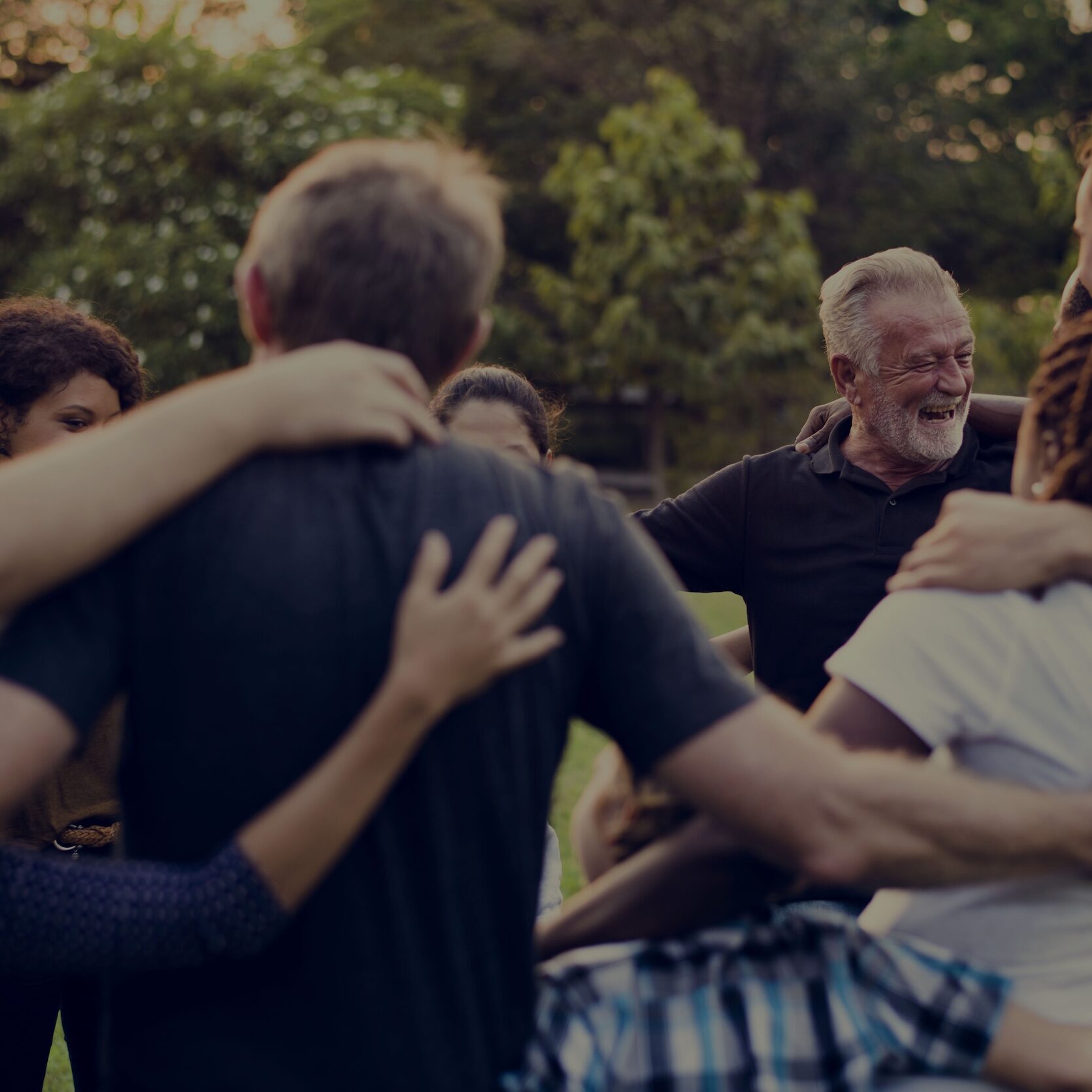 Group of people support unity arm around together